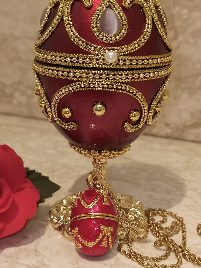 Mother's Day gift from daughter: Red Fabergé egg music box trinket and Fabergé-style egg pendant. Perfect for wife’s birthday, mom gift, sister's anniversary, or as a gift for a wife.