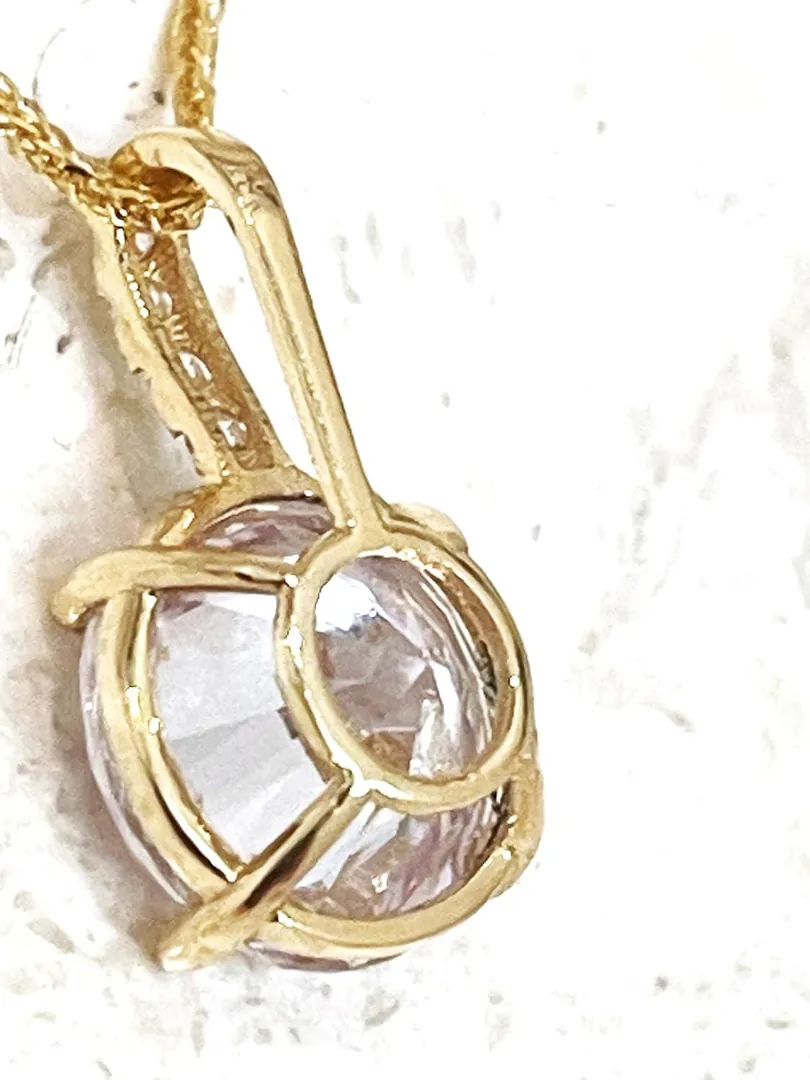 1.5ct Solitaire Diamond Round Pendant Necklace in 18k Solid Gold. This gold round pendant necklace is made of 18kt yellow gold and makes an ideal birthday gift for women.