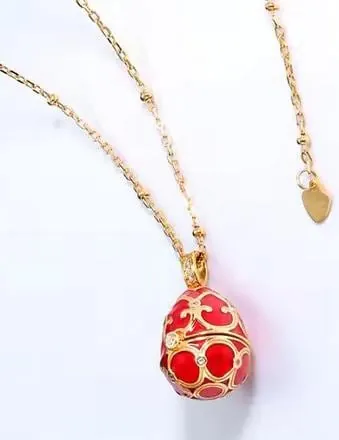 The Pierre Lorren Silver Faberge egg is a handcrafted piece featuring a red design. It showcases intricate detailing, typical of Faberge-style artistry. If you have specific questions about it or need more information, feel free to ask!