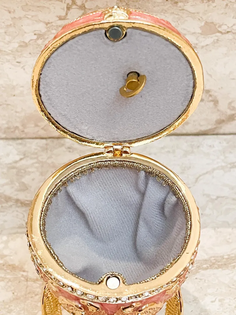 Limited Edition Musical Pink Faberge Egg with Velour Interior and Swarovski Crystal Diamond Handset. Faberge Style Egg, perfect as a birthday gift for her or a graduation gift.
