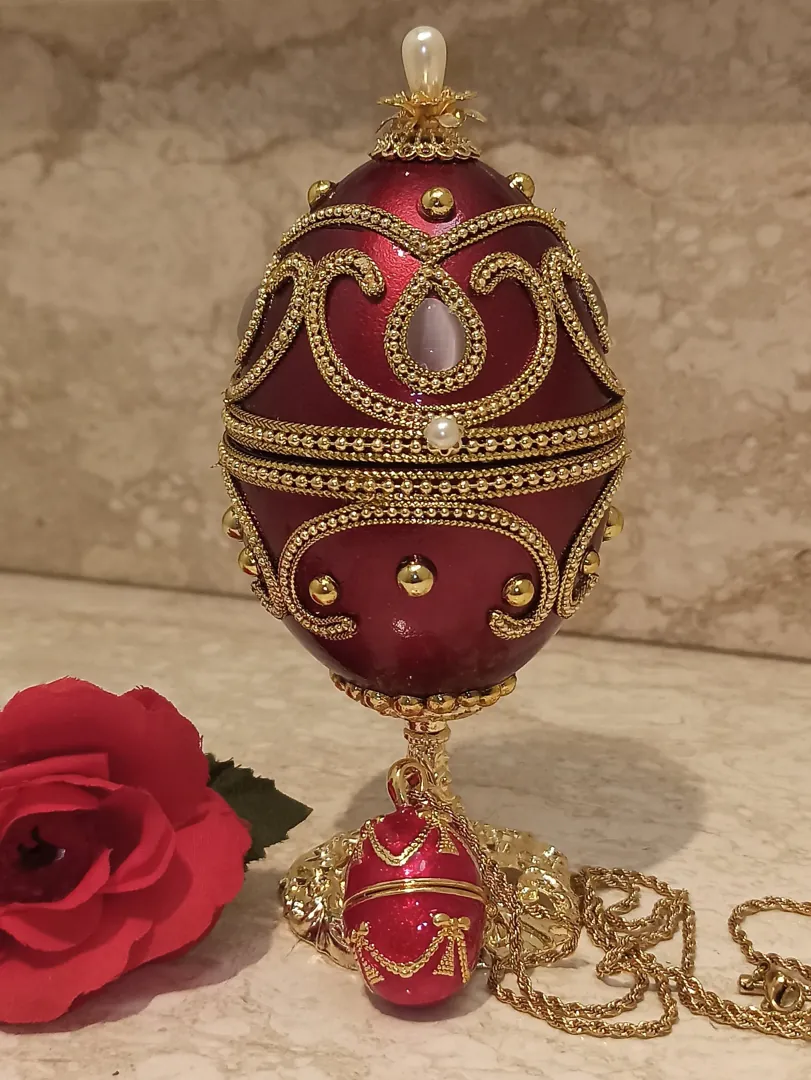 Mother's Day gift from daughter: Red Fabergé egg music box trinket and Fabergé-style egg pendant. Perfect for wife’s birthday, mom gift, sister's anniversary, or as a gift for a wife.