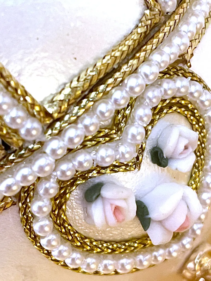 Vintage 2015 Faberge Egg Necklace featuring a Musical Carousel. Hand-carved natural egg with pure gold detailing and Swarovski diamonds. A perfect 10th anniversary gift for a wife.