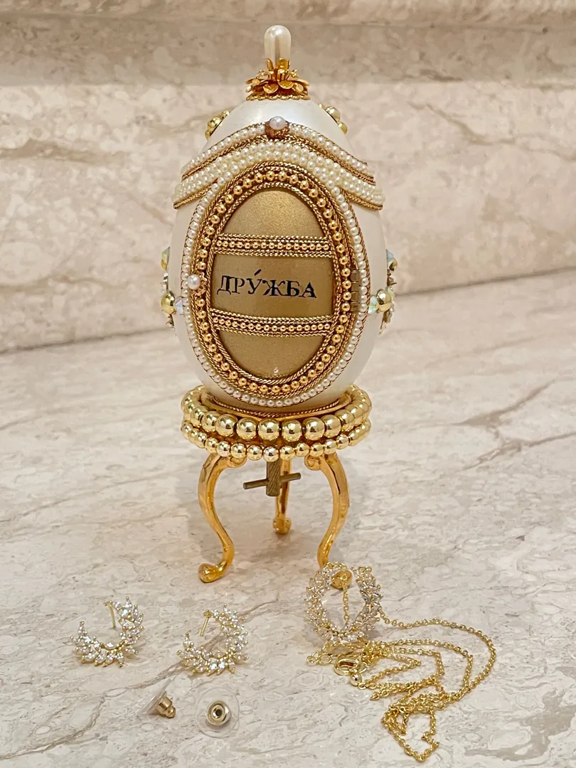 ONE OF A KIND Faberge Egg Jewelry Box for Daughter Wedding Day Gifts. This collectible item features Swarovski handset details and is designed in the Fabergé egg style. It comes with a natural hand-carved egg.