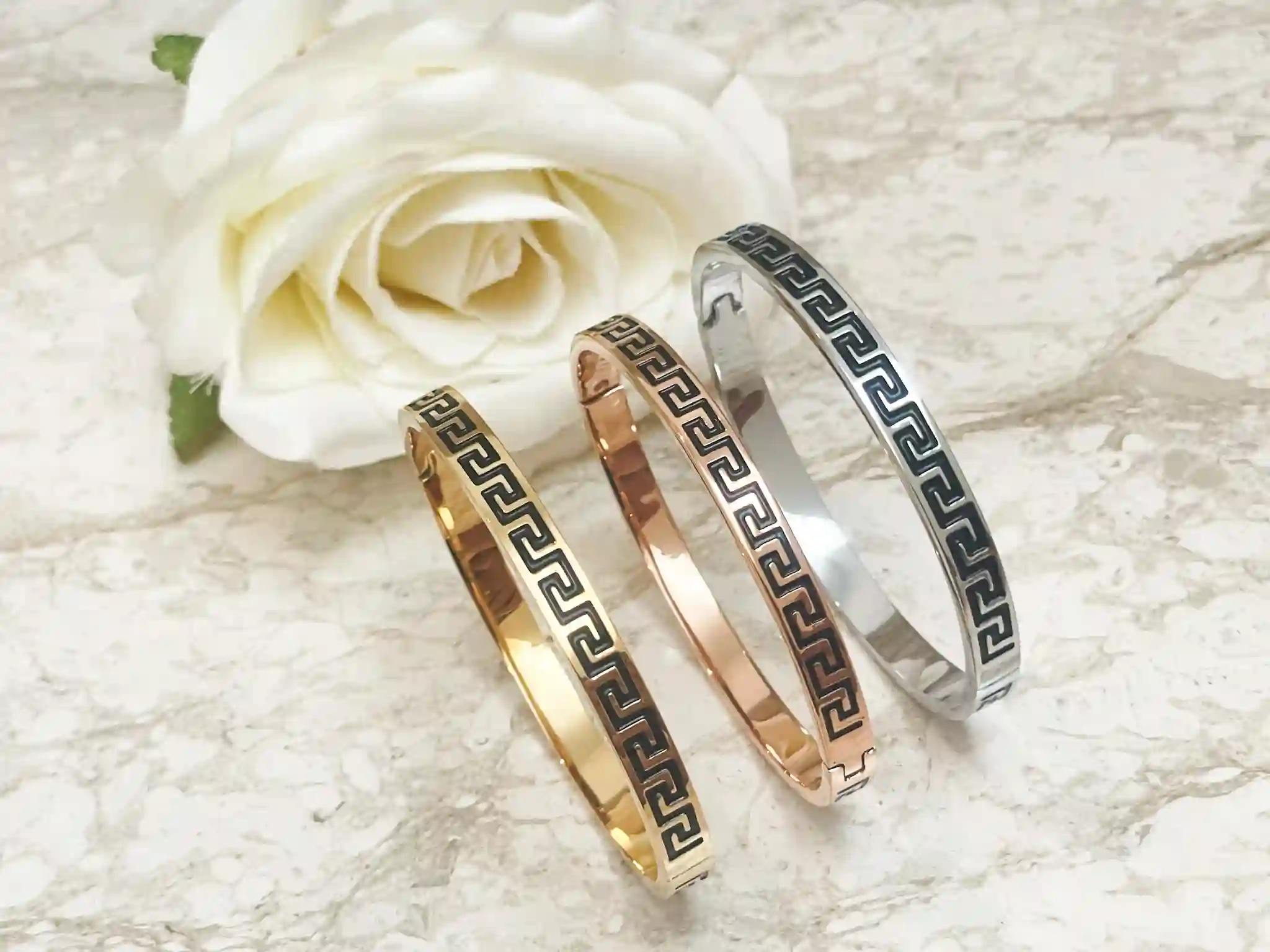 3 x Meander Bracelets - 8mm Greek Key Bangle HANDMADE Jewelry Gift Infinity Bangle Bracelet Greek Jewelry for Women Graduation Success HANDMADE by Pierre Lorren

🏺Handmade by our in-house master jewelers in Cyprus—on the island of beauty and love, Aphrodite

🏺 Vermeil-style 18K gold over sterling silver for a warm, opulent sheen

🏺 The 8 mm broad Greek Key/Mander motif represents harmony, eternity, wealth, and endless life.

🏺 Stylish clip/box fastening for a snug, cozy fit

🏺 Classic geometric style that enhances both special occasion and daily ensembles

sharp lines, a high-gloss finish, and painstaking, handmade workmanship

🏺 A thoughtful present for milestones, anniversaries, Christmas, New Year's, and birthdays

🏺 Present-ready: comes with a certificate of authenticity and in a Pierre Lorren box and bag.

🏺 Versatile styling: looks great with gold or silver pieces and stacks with bangles.

🏺 Skin-friendly and nickel-free materials for comfortable daily use in 