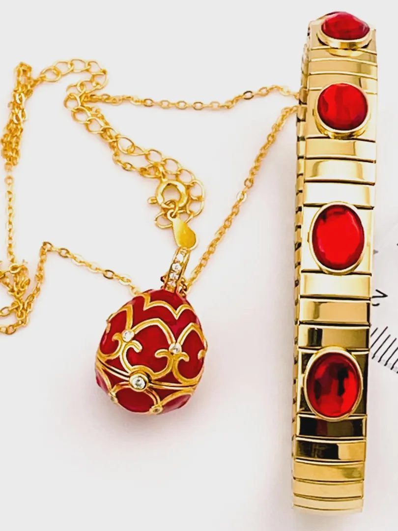 The Pierre Lorren Silver Faberge egg is a handcrafted piece featuring a red design. It showcases intricate detailing, typical of Faberge-style artistry. If you have specific questions about it or need more information, feel free to ask!
