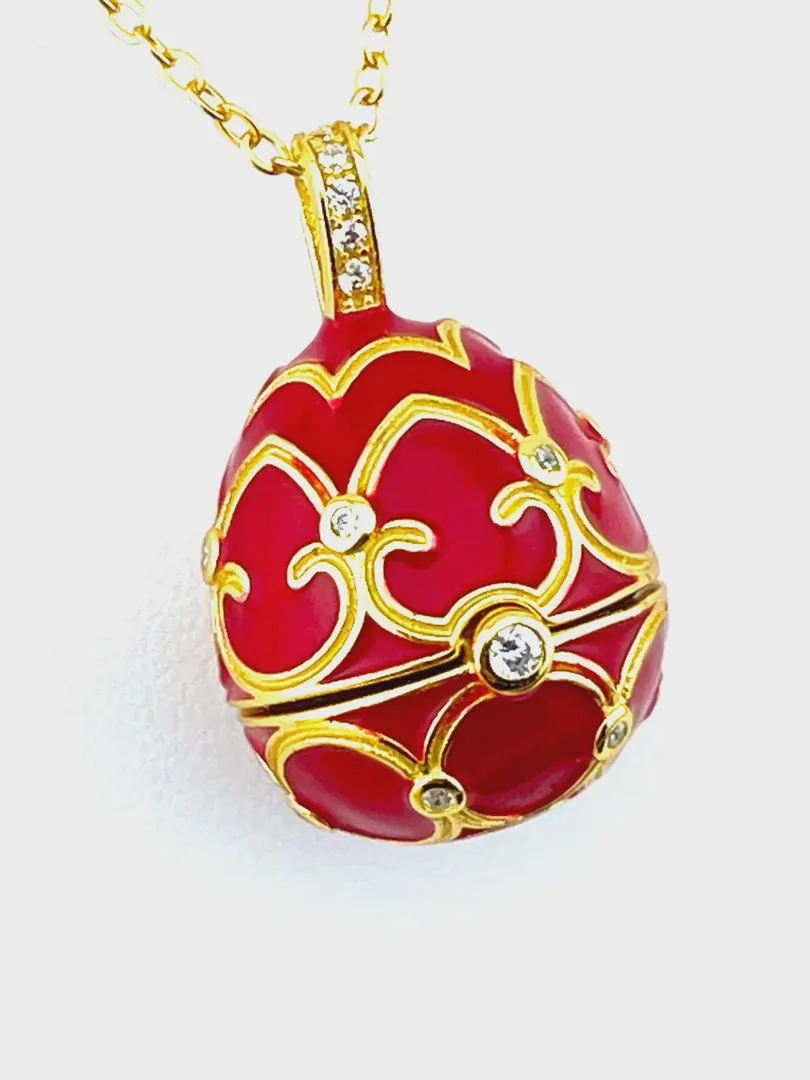 The Pierre Lorren Silver Faberge egg is a handcrafted piece featuring a red design. It showcases intricate detailing, typical of Faberge-style artistry. If you have specific questions about it or need more information, feel free to ask!